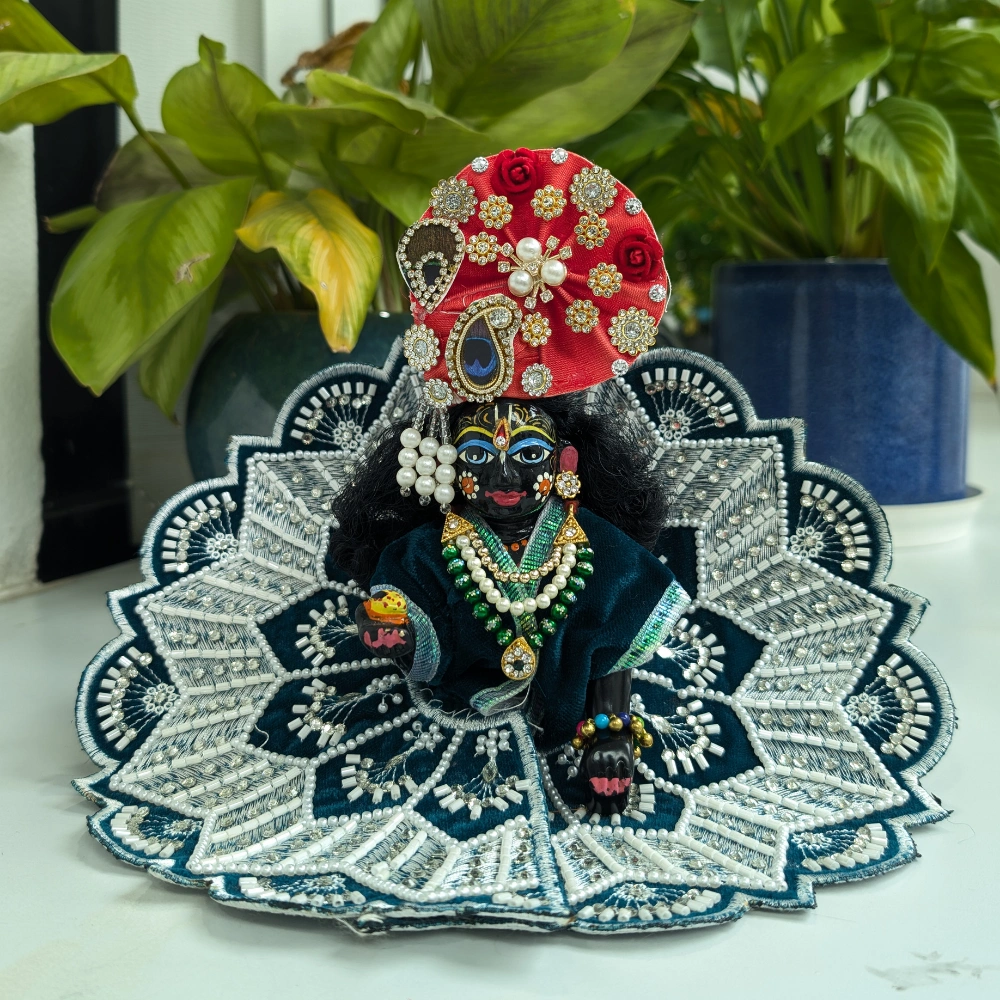 designer kanha green poshak with heavy beadwork.webp